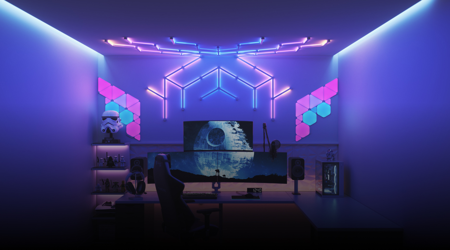 Futuristic gaming setup with Nanoleaf smart home lighting RGB smart lights above the PC monitor. Must have gaming lights for any gamer.