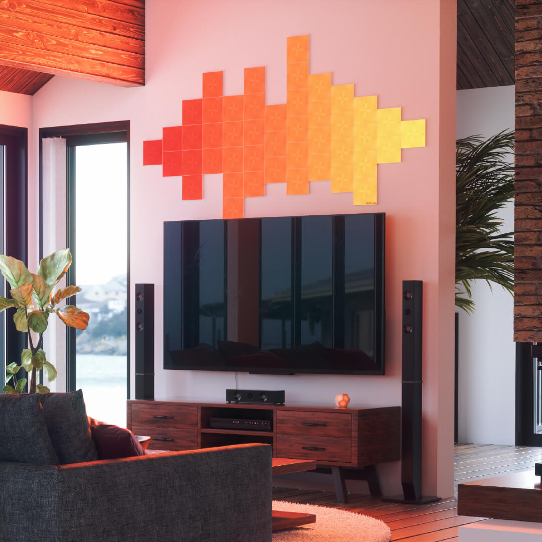 Painéis de luz Nanoleaf Canvas modulares quadrados com mudança de cor, montados na parede de uma sala de estar. Semelhante ao Philips Hue, Lifx. HomeKit, Google Assistant, Amazon Alexa, IFTTT. 
